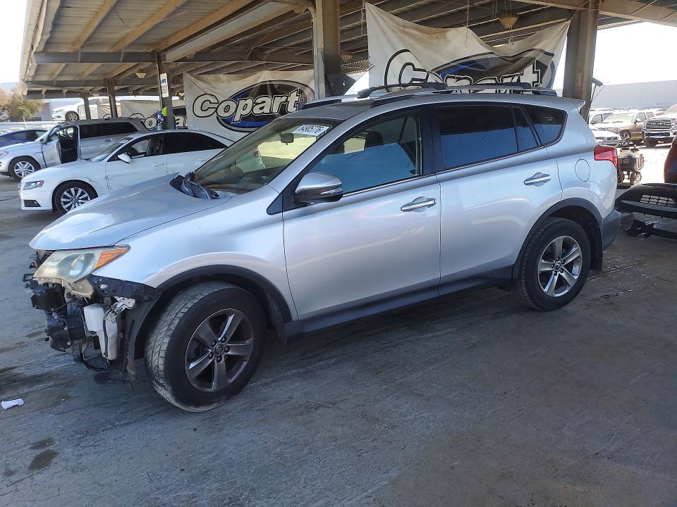 TOYOTA RAV4 2015 с VIN JTMRFREV8FD128812 - Снимка от търг