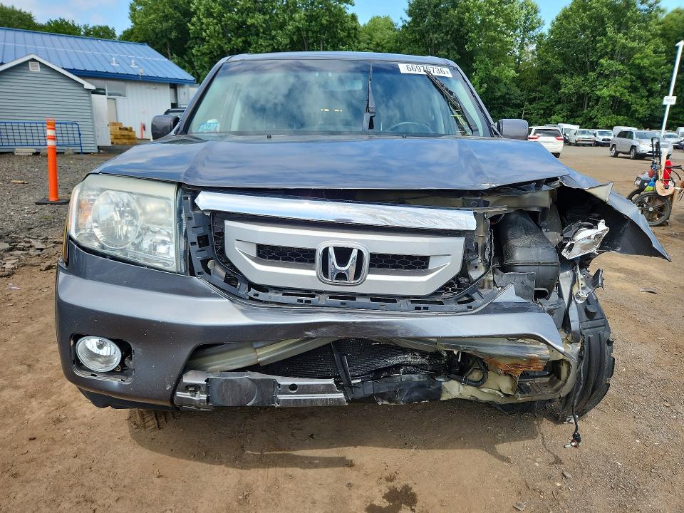 Photo 5 from auction – 2011 HONDA PILOT with VIN 5FNYF4H53BB104866