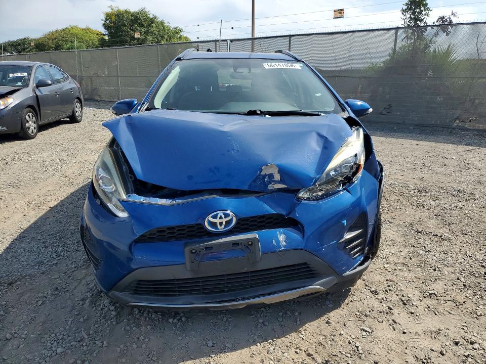 Photo 5 from auction – 2018 TOYOTA PRIUS C with VIN JTDKDTB32J1604845