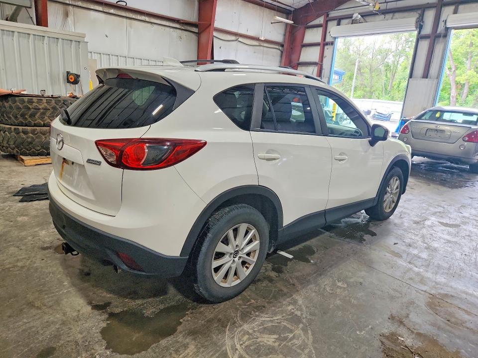 Photo 3 from auction – 2014 MAZDA CX-5 with VIN JM3KE2CY2E0356665
