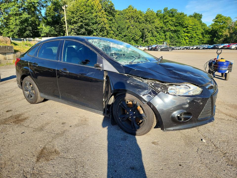 Photo 4 from auction – 2014 FORD FOCUS with VIN 1FADP3F24EL460040