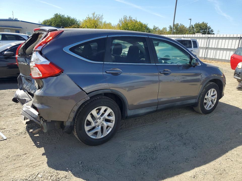 Photo 3 from auction – 2015 HONDA CR-V with VIN 2HKRM4H53FH640962