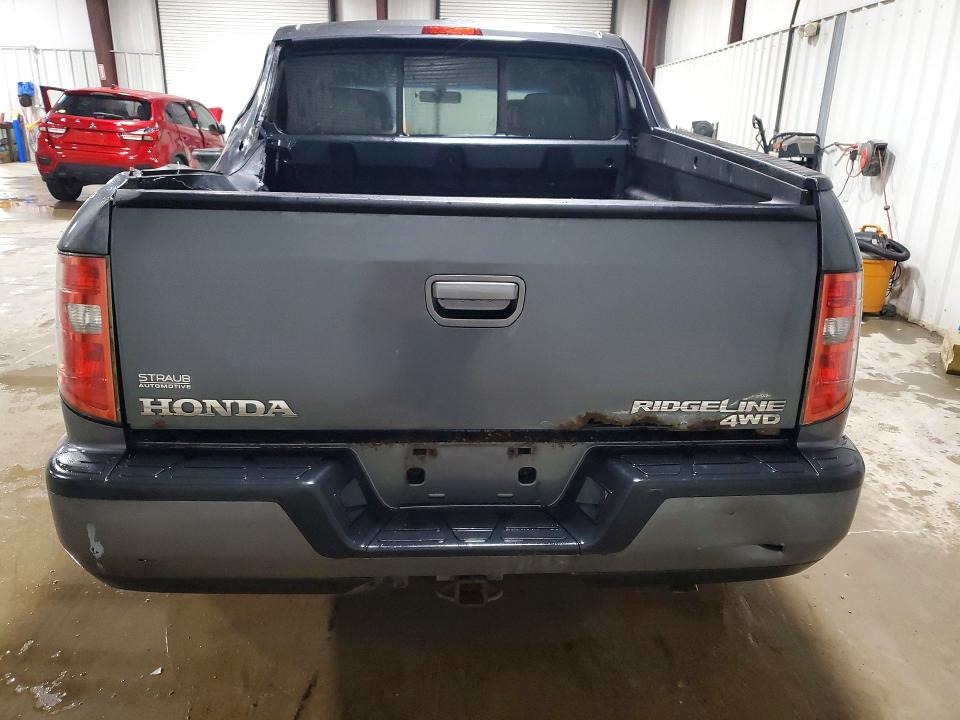 Photo 6 from auction – 2011 HONDA RIDGELINE with VIN 5FPYK1F55BB006538