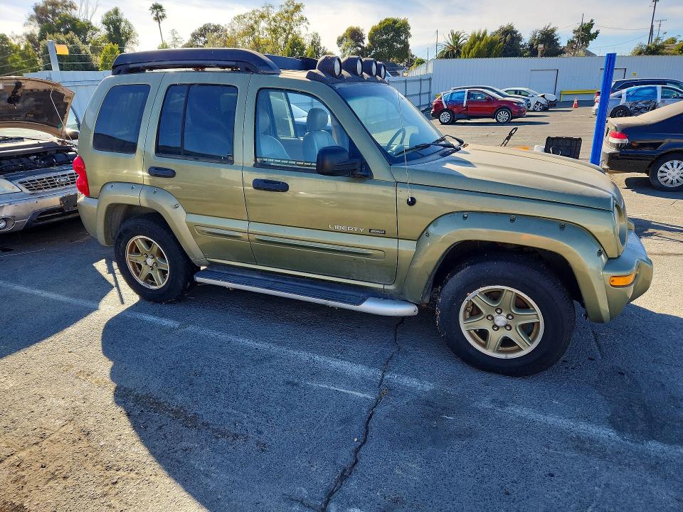 Photo 4 from auction – 2003 JEEP LIBERTY with VIN 1J4GL38K13W554382