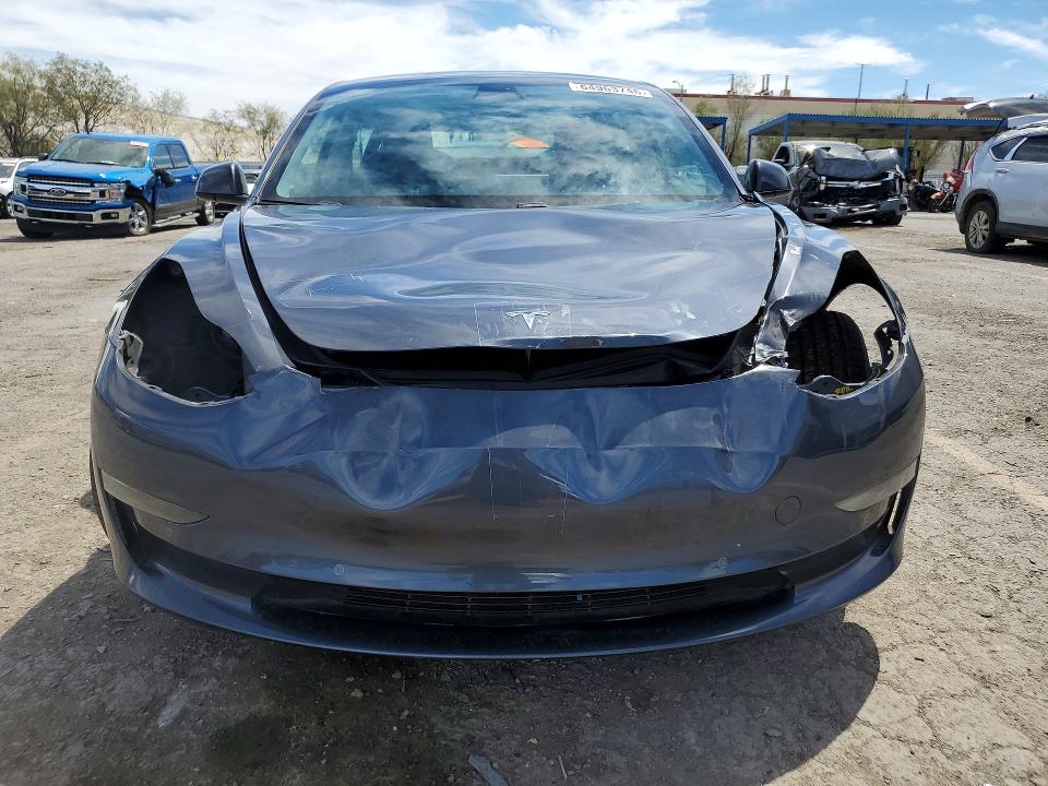 Photo 5 from auction – 2021 TESLA MODEL 3 with VIN 5YJ3E1EA0MF072085