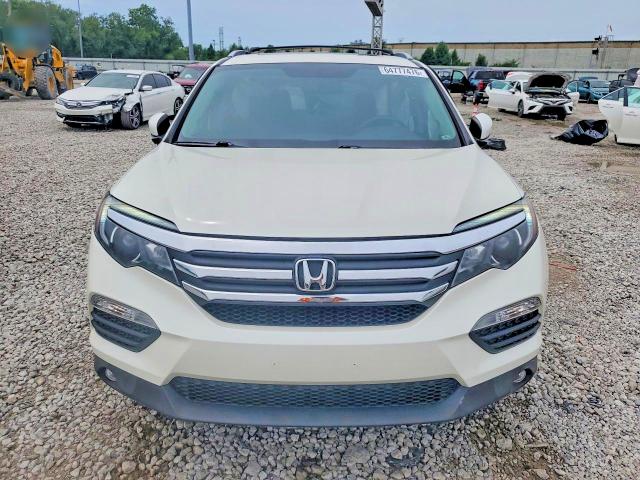 Foto 5 de la subasta – 2017 HONDA PILOT con VIN 5FNYF6H56HB032615