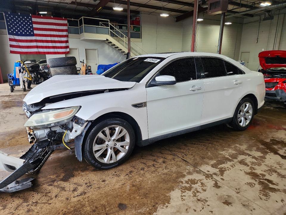 FORD TAURUS 2011 with VIN 1FAHP2EWXBG100579 - Photo from auction