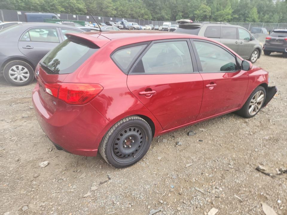 Photo 3 from auction – 2011 KIA FORTE5 with VIN KNAFW5A39B5451865