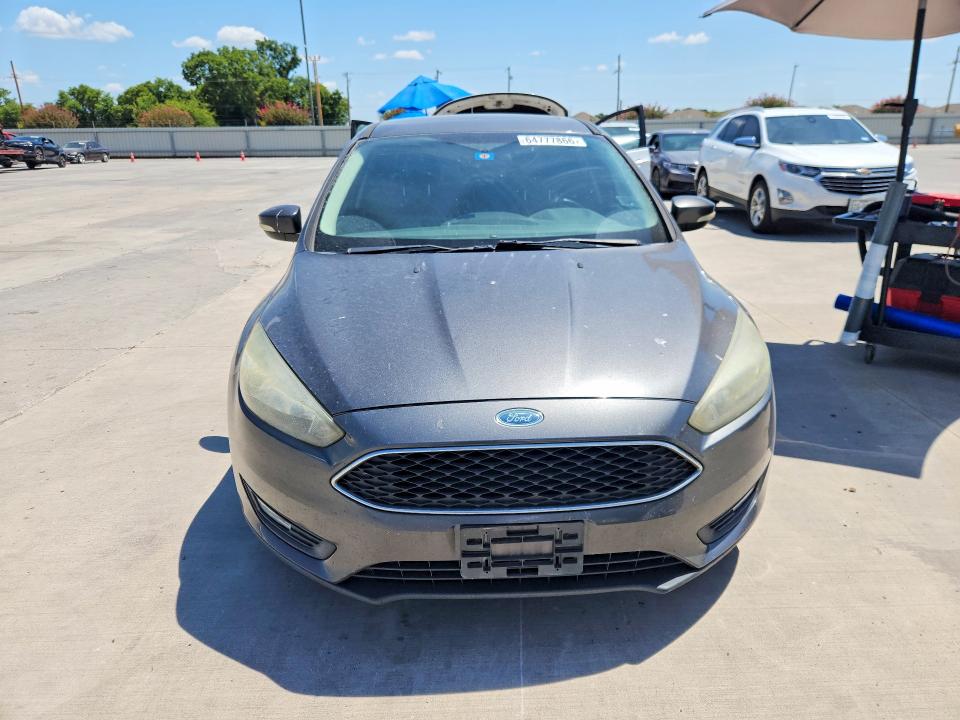 Photo 5 from auction – 2016 FORD FOCUS with VIN 1FADP3F25GL334837
