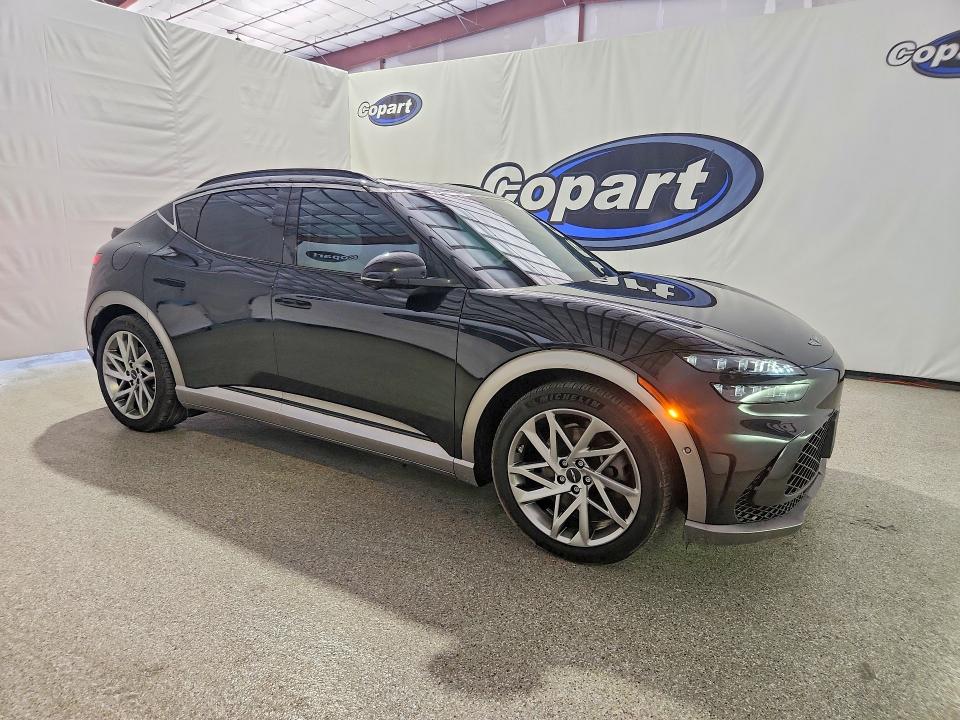 Photo 4 from auction – 2024 GENESIS GV60 with VIN KMUKCDSC1RU020291