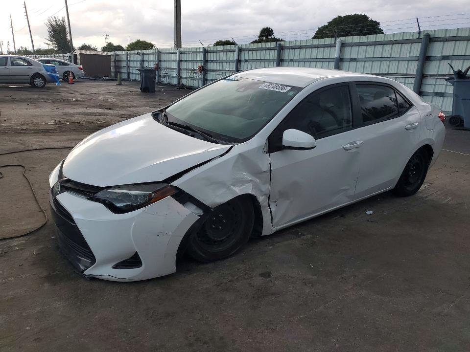 TOYOTA COROLLA 2018 with VIN 5YFBURHE1JP847666 - Photo from auction