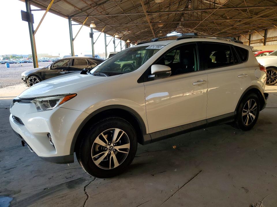 TOYOTA RAV4 2017 with VIN JTMRFREV3HJ715827 - Photo from auction