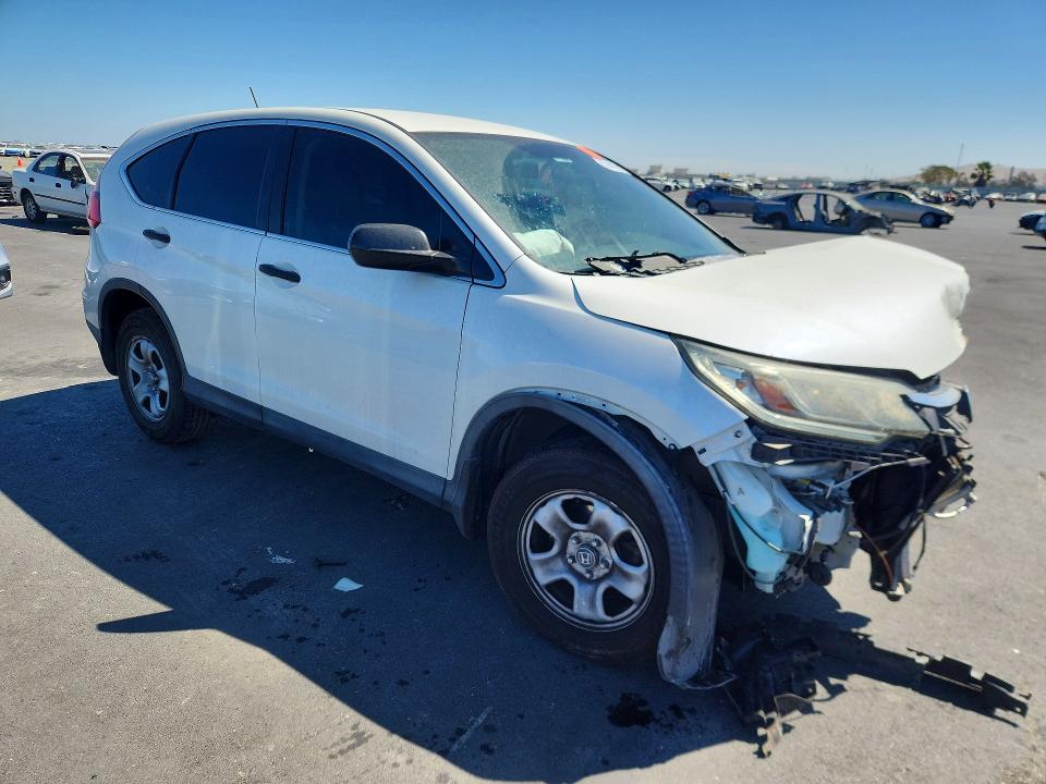 Photo 4 from auction – 2015 HONDA CR-V with VIN 5J6RM4H35FL024572