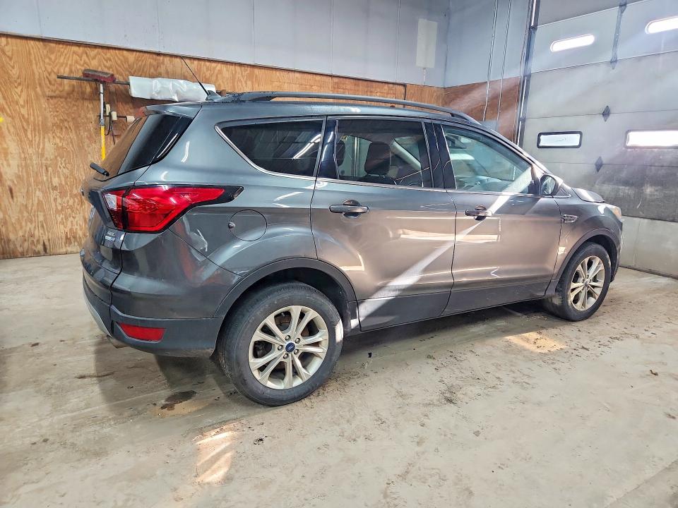 Photo 3 from auction – 2019 FORD ESCAPE with VIN 1FMCU9HD9KUA94643