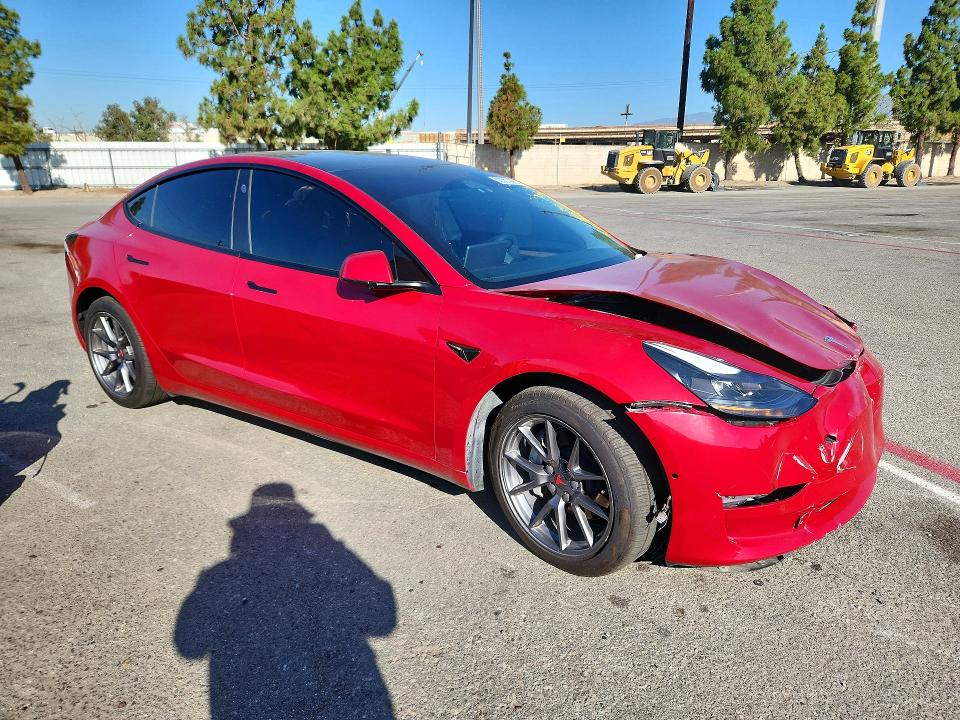 Photo 4 from auction – 2021 TESLA MODEL 3 with VIN 5YJ3E1EB1MF998584