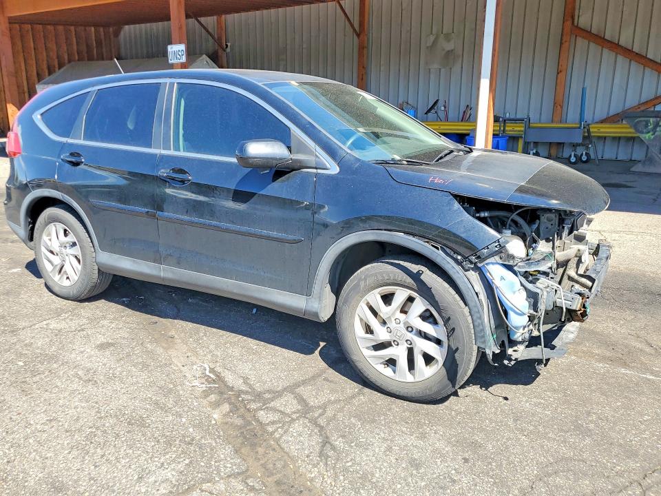 Photo 4 from auction – 2015 HONDA CR-V with VIN 2HKRM4H5XFH643955