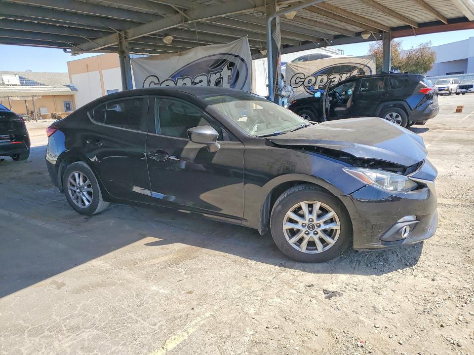 Photo 4 from auction – 2015 MAZDA 3 with VIN 3MZBM1V74FM169711