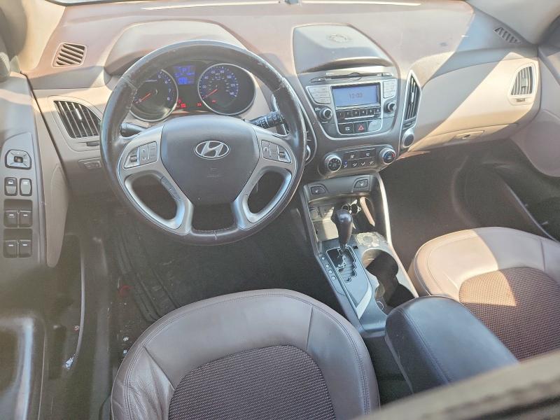 Photo 8 from auction – 2012 HYUNDAI TUCSON with VIN KM8JUCAC6CU379940