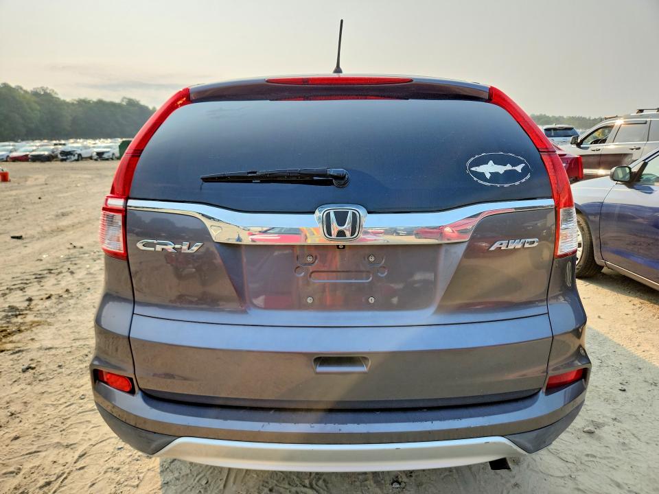 Photo 6 from auction – 2015 HONDA CR-V with VIN 2HKRM4H5XFH605352
