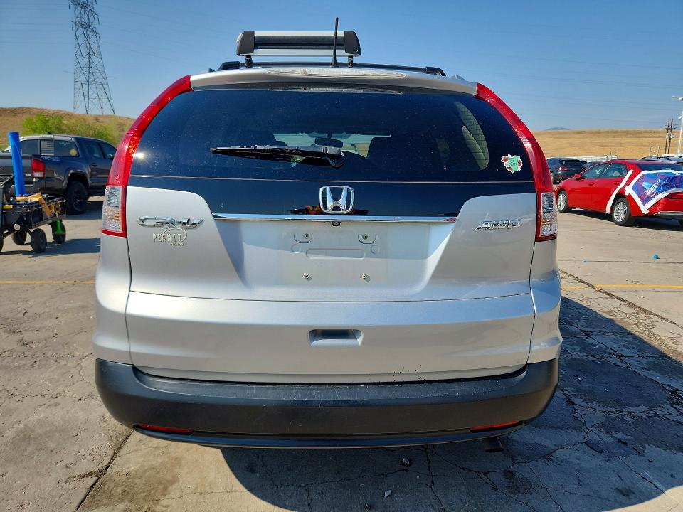 Photo 6 from auction – 2014 HONDA CR-V with VIN 5J6RM4H77EL091370