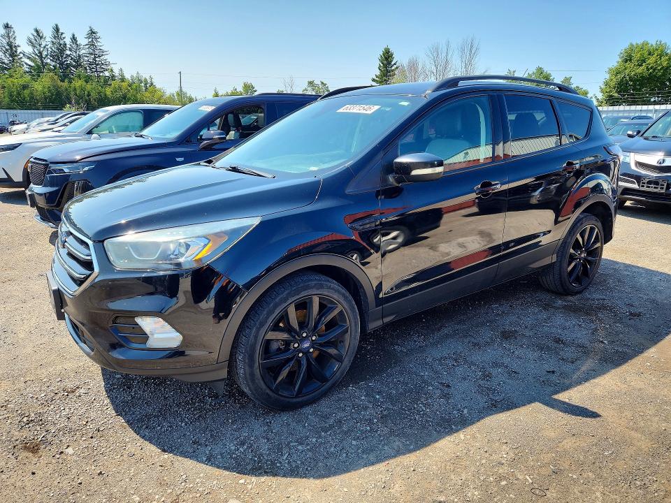 FORD ESCAPE 2017 with VIN 1FMCU0J91HUE58760 - Photo from auction