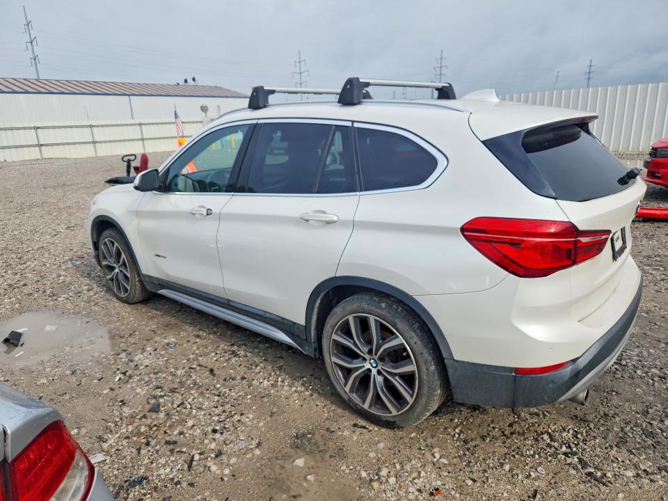 Photo 2 from auction – 2016 BMW X1 with VIN WBXHT3C36GP881907
