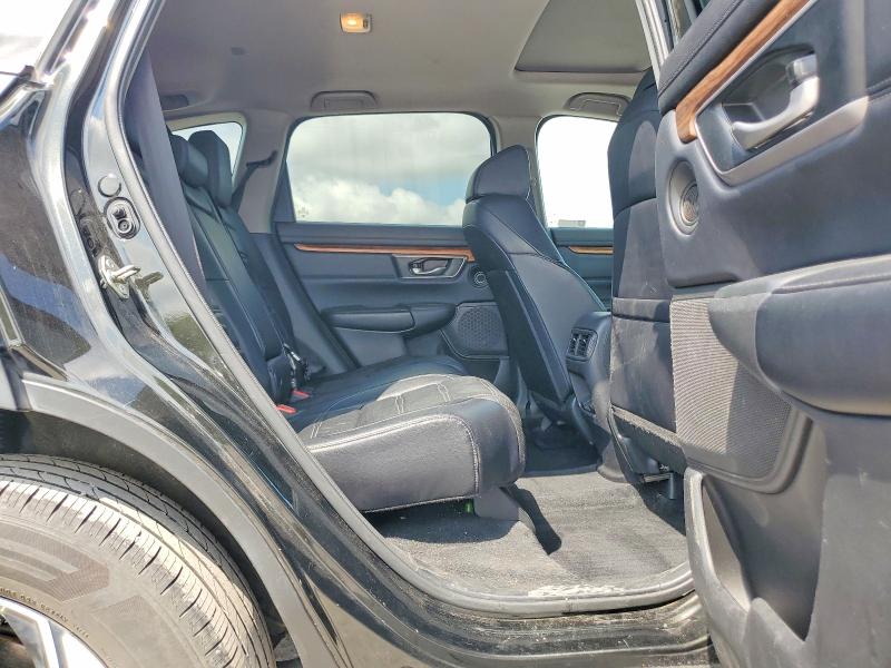 Photo 11 from auction – 2018 HONDA CR-V with VIN 7FARW2H90JE038209
