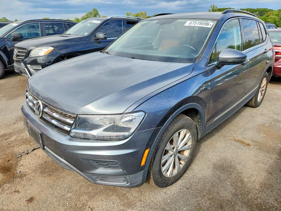 VOLKSWAGEN TIGUAN 2018 with VIN 3VV2B7AX2JM162266 - Photo from auction