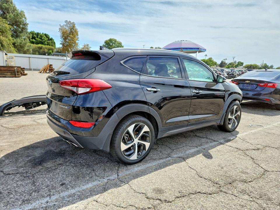 Photo 3 from auction – 2016 HYUNDAI TUCSON with VIN KM8J33A23GU165066