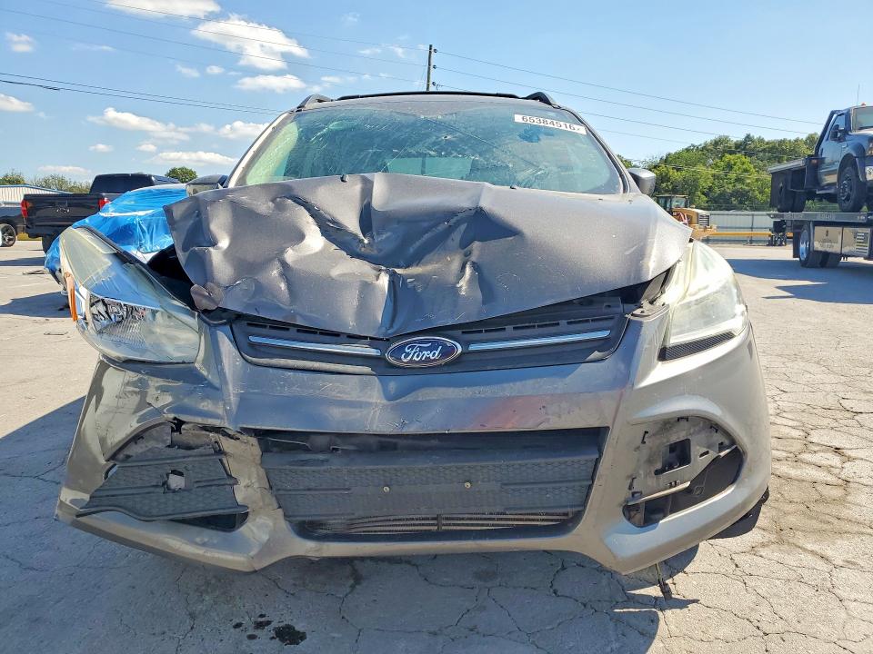 Photo 5 from auction – 2013 FORD ESCAPE with VIN 1FMCU0G94DUD15920