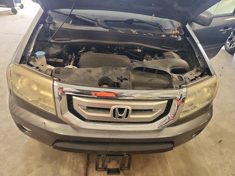 Photo 12 from auction – 2011 HONDA PILOT with VIN 5FNYF4H54BB009328