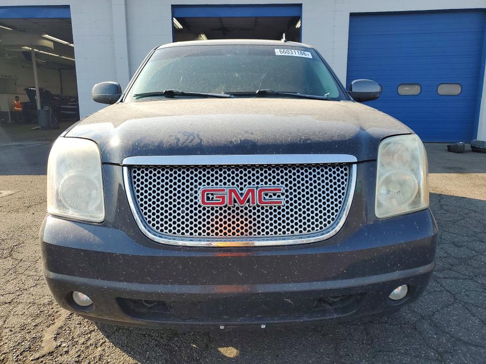 Photo 5 from auction – 2008 GMC YUKON with VIN 1GKFK63828J238306