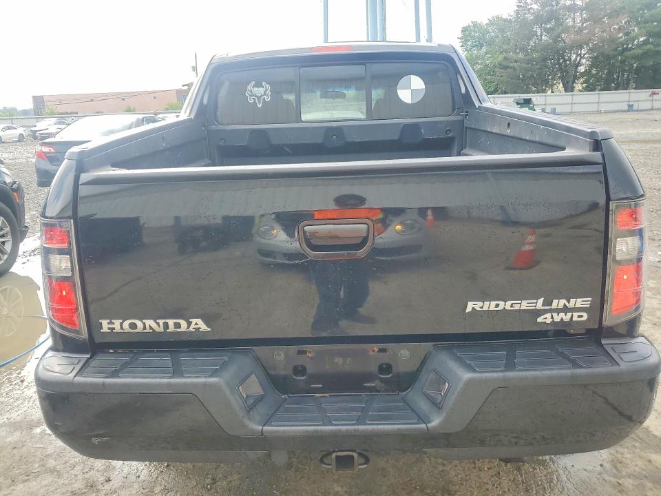 Photo 6 from auction – 2012 HONDA RIDGELINE with VIN 5FPYK1F76CB452555