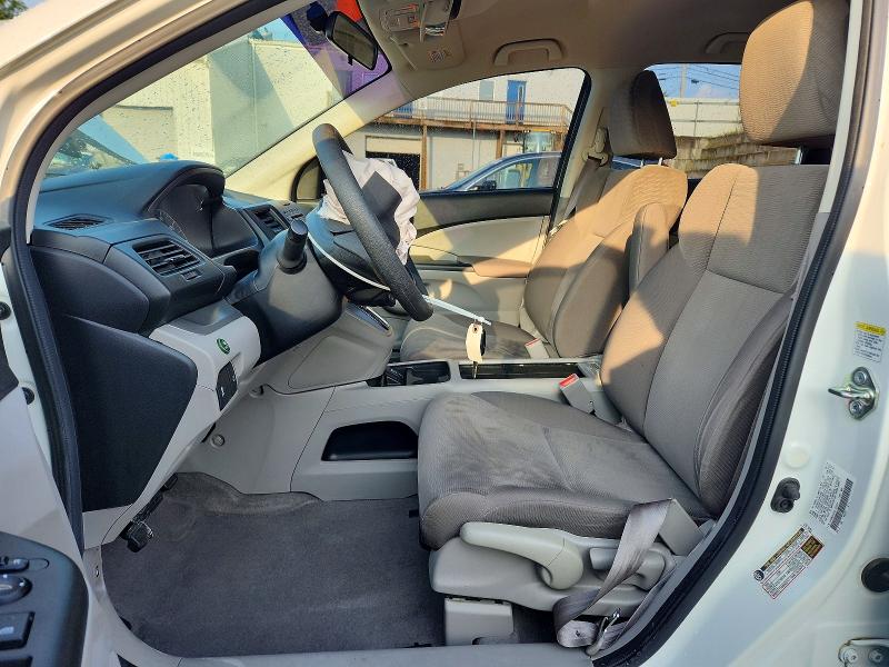 Photo 7 from auction – 2014 HONDA CR-V with VIN 5J6RM4H35EL102024