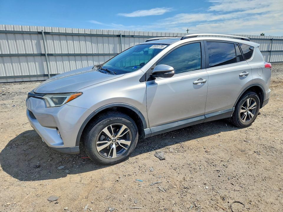 TOYOTA RAV4 2018 with VIN 2T3WFREV9JW476701 - Photo from auction