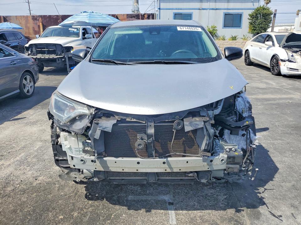 Photo 5 from auction – 2018 TOYOTA RAV4 with VIN 2T3ZFREV4JW474884