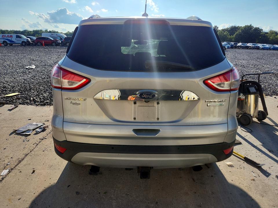 Photo 6 from auction – 2014 FORD ESCAPE with VIN 1FMCU0J99EUB60047