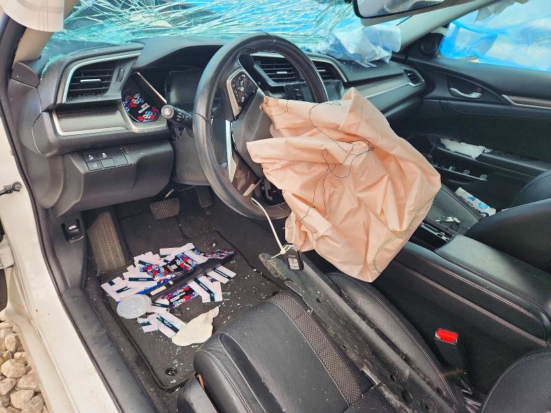 Photo 8 from auction – 2021 HONDA CIVIC with VIN 19XFC1F71ME008830