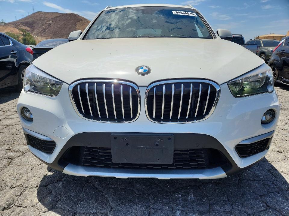 Photo 5 from auction – 2018 BMW X1 with VIN WBXHU7C32J3H42542