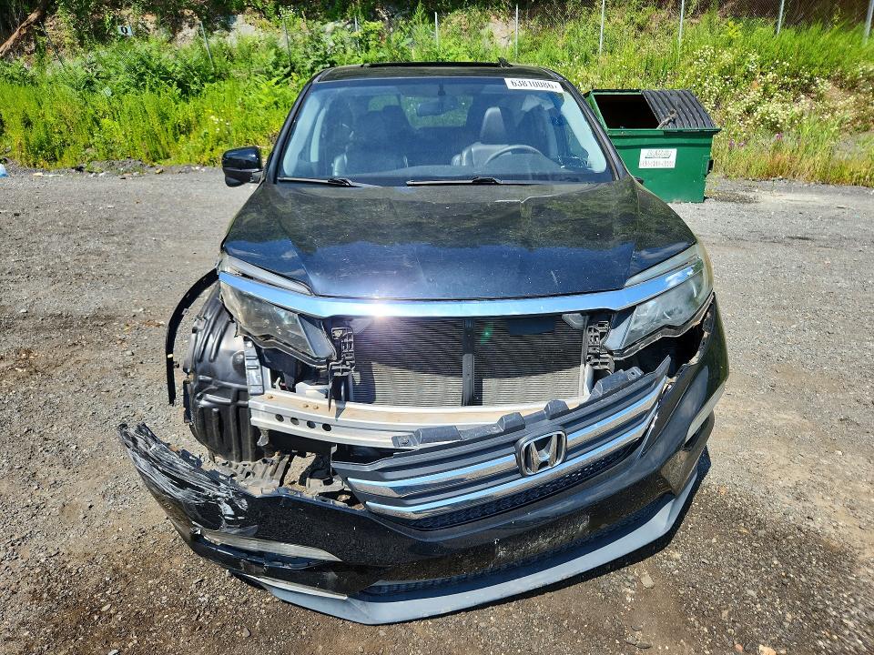 Photo 5 from auction – 2016 HONDA PILOT with VIN 5FNYF6H59GB022501