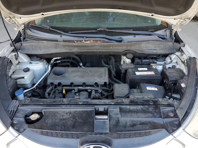 Photo 12 from auction – 2011 HYUNDAI TUCSON with VIN KM8JU3AC1BU156848
