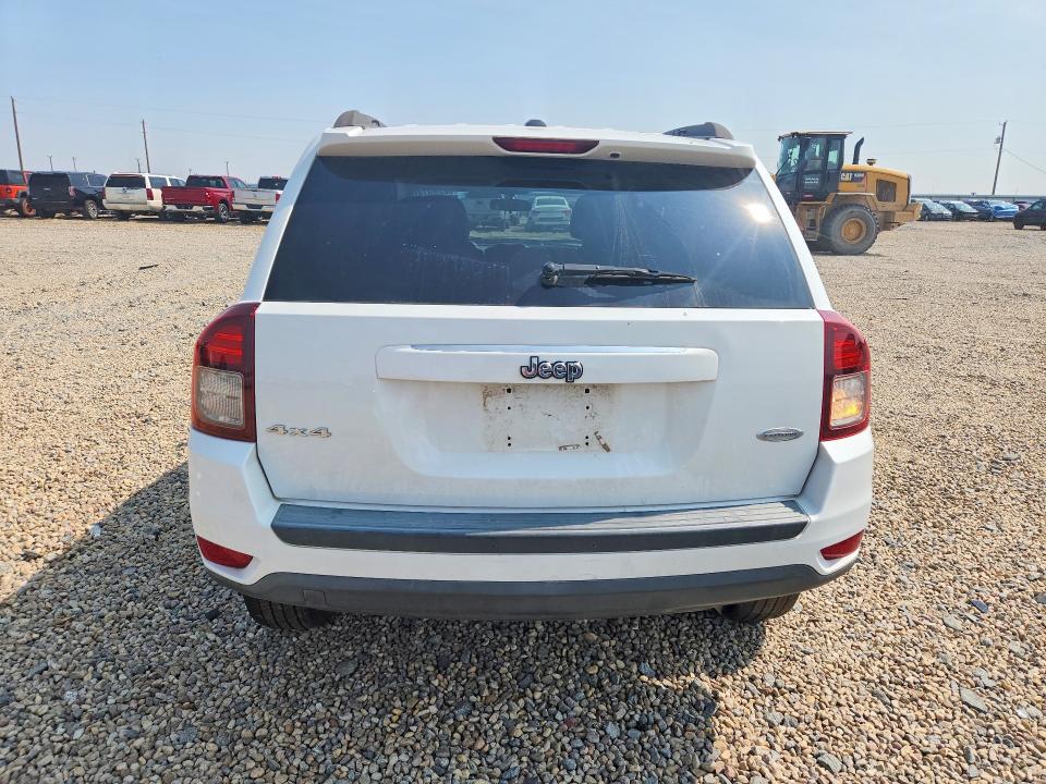 Photo 6 from auction – 2014 JEEP COMPASS with VIN 1C4NJDEB5ED713903