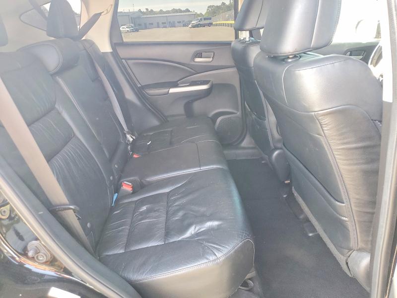 Photo 11 from auction – 2014 HONDA CR-V with VIN 2HKRM4H74EH685702