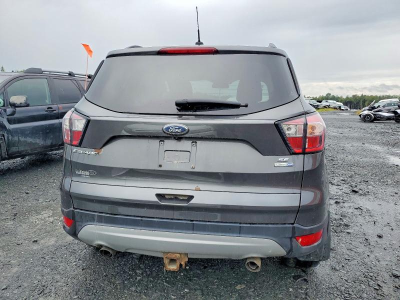 صورة رقم 6 من المزاد - 2018 FORD ESCAPE مع VIN 1FMCU9GDXJUC51693