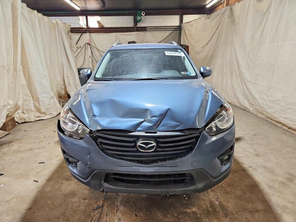 Photo 5 from auction – 2016 MAZDA CX-5 with VIN JM3KE4CY9G0608197