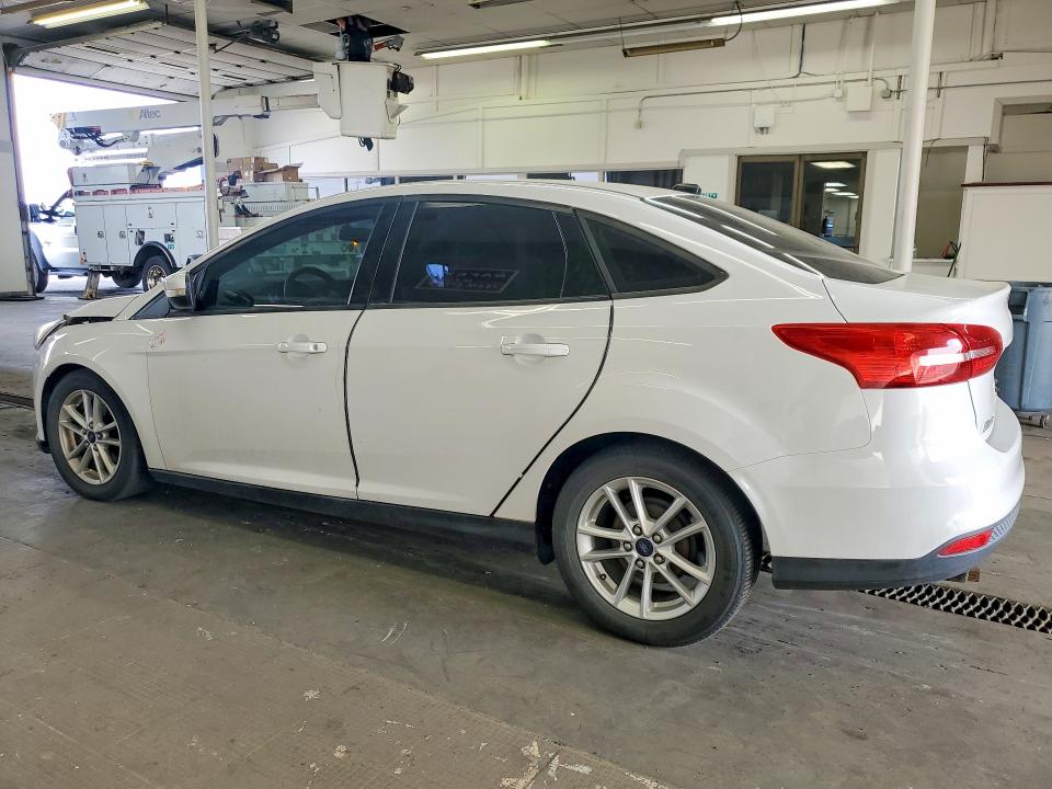 Photo 2 from auction – 2015 FORD FOCUS with VIN 1FADP3F2XFL349154
