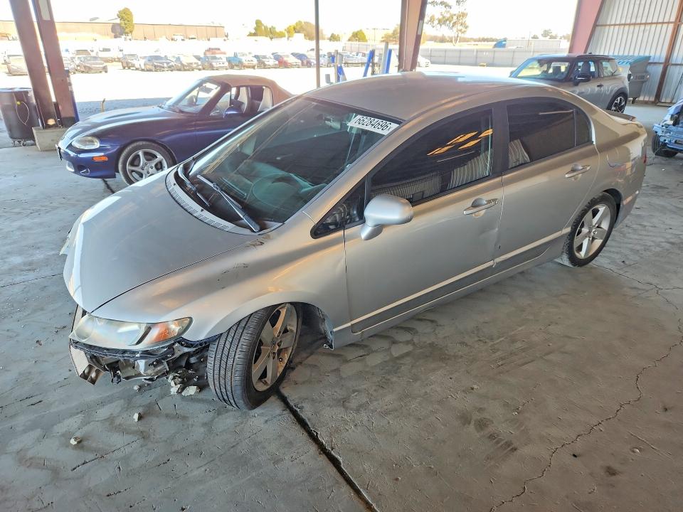 HONDA CIVIC 2009 with VIN 19XFA16689E021370 - Photo from auction