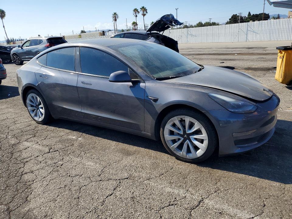 Photo 4 from auction – 2022 TESLA MODEL 3 with VIN 5YJ3E1EB7NF166796