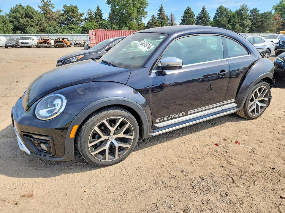 VOLKSWAGEN BEETLE 2018 with VIN 3VWSD7AT7JM706165 - Photo from auction