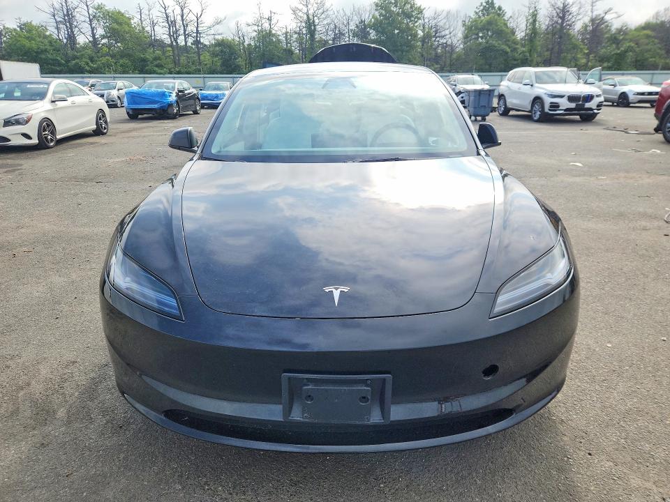 Photo 5 from auction – 2025 TESLA MODEL 3 with VIN 5YJ3E1EA2SF044091